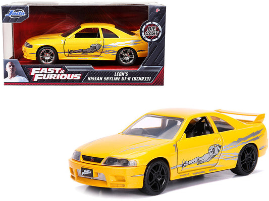 Leon's Nissan Skyline GT-R (BCNR33) Yellow Metallic with Graphics "Fast & Furious - Hillery's Products & Services